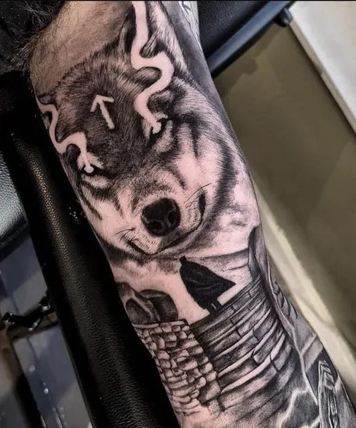 Black and grey wolf forearm piece by Kai Nakamura